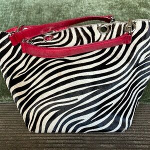 Maurizio Tatitu purse